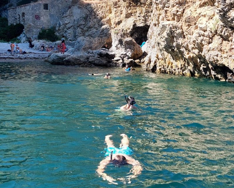 Sesimbra: Secret Bays and Beaches Boat Tour with Snorkeling - Praia da Mijona: More Snorkel Time in Another Wild Cove