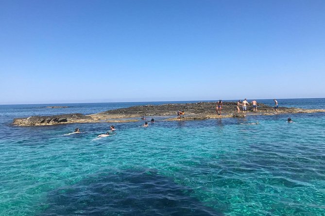 Shared snorkeling tour from Tropea to Capo Vaticano - Stop 4: Spiaggia di Riaci for open-water beauty and clean entries
