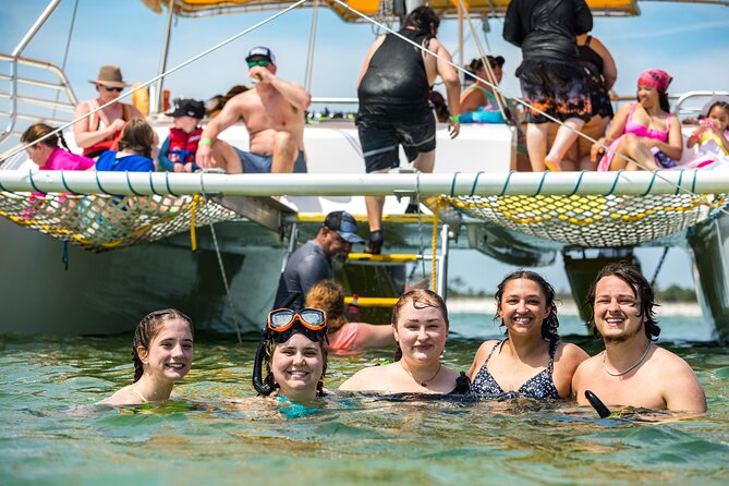 Snorkel & Dolphin Sightseeing Tour Aboard the Footloose - Shell Island Snorkeling: Gear, Beginner Comfort, and Shell Finds
