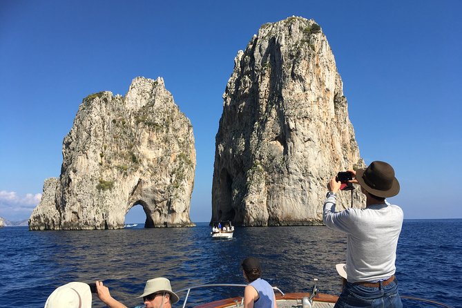 Sorrento: Capri Select Boat Trip with Swim, Drinks & Pick Up - Anacapri visual stop and quick grotto moments: short, scenic, and not overlong