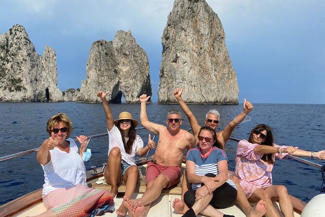 Sorrento: Capri Select Boat Trip with Swim, Drinks & Pick Up - Faraglioni and grotto photos: quick stops for iconic Capri angles