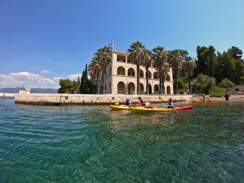 Split: Guided Sea Kayaking Tour with Snorkeling - Cliff jumping, photos, and that slightly competitive spirit