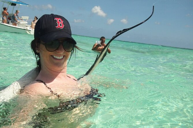 Stingray City Experience Plus Two Snorkeling Stops on Grand Cayman - Getting There: Pickup Along Seven Mile Beach and Meet Points