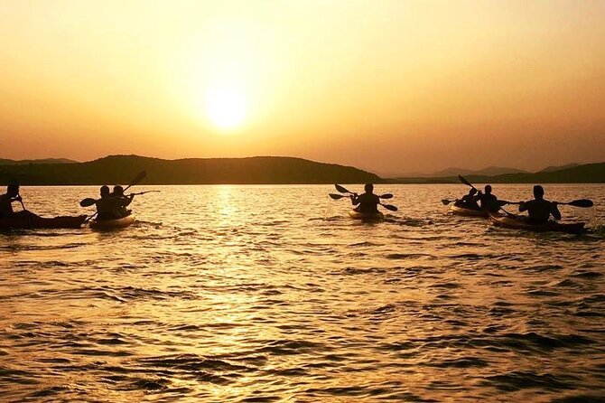 Sunset Kayak Tour with Snorkeling and Local Aperitif - Key highlights you’ll feel right away