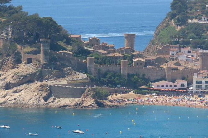 Tossa de Mar: Kayak & Snorkel Tour with Paella from Barcelona - Kayaking and snorkeling along Costa Brava caves and cliffs