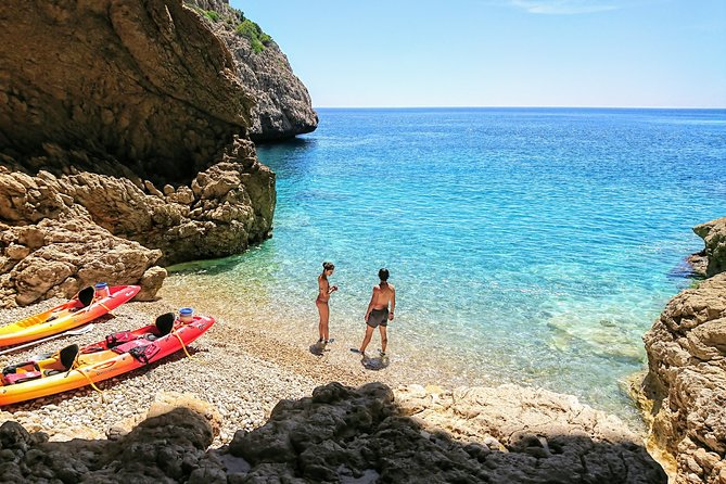 Uncharted Caves & Snorkelling Heaven: Cala Granadella Kayak Tour - Meeting at Platja Granadella and getting set fast