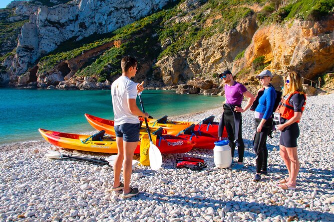 Uncharted Caves & Snorkelling Heaven: Cala Granadella Kayak Tour - The kayak portion: cruising between secret coves