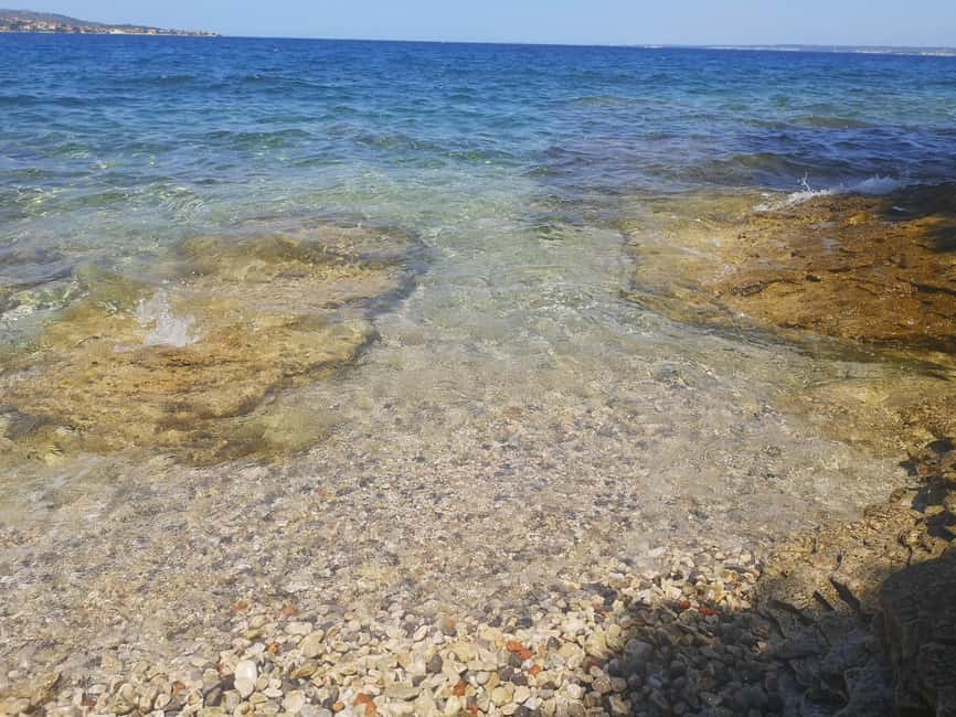 Zadar: 3-Stop Blue Lagoon & Snorkeling Cruise with Drinks - Stop 2: Ugljan Island Village Walks and Seafood on a Small-Chill Schedule