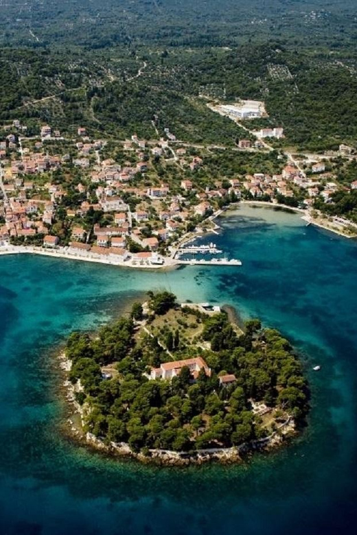 Zadar: RIB boat Tour to Hidden Bays with Snorkeling & Drinks - Ugljan Island village time in Kali: walking, food, and seaside breaks