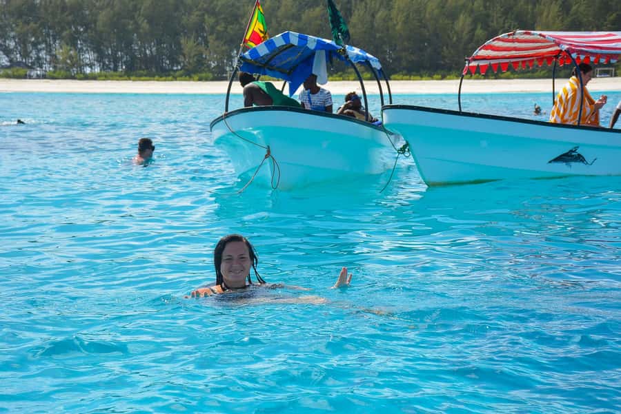 Zanzibar: Mnemba island Snorkeling & Boat Tour with Lunch - Dolphins on the route: exciting when they happen, tricky when boats gather