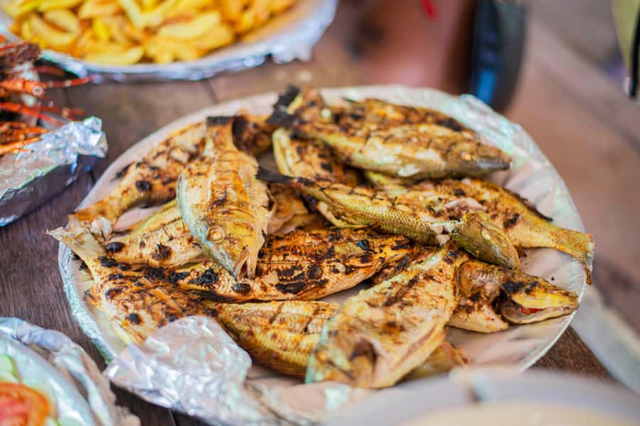Zanzibar: Safari Blue Lagoon Trip with Snorkeling and Lunch - Kwale Island: seafood lunch, fruit, baobab tree, and a little shopping time